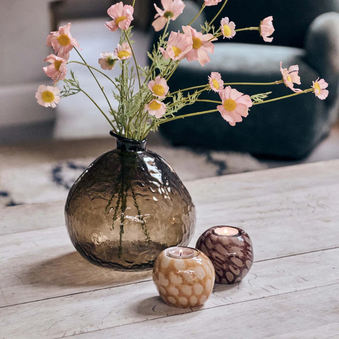 The ABIGAIL AHERN - SOFT PINK COSMOS MEADOW features delicate faux pink cosmos blooms and sparse green leaves, ideal for subtle botanical decor. Perfect as a single stem accent against any plain backdrop.
