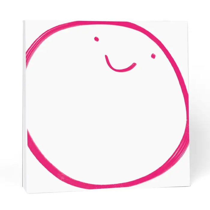 The E. FRANCES – CHUNKY NOTEPAD BIG SMILE by E. FRANCES PAPER features a playful pink smiley face on a white 6x6 notepad with thick chipboard backing.