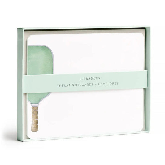 The E. FRANCES PAPER Pickleball Flat Notes boxed set includes 8 flat notecards with matching envelopes, each featuring a green pickleball paddle illustration—made in the USA.