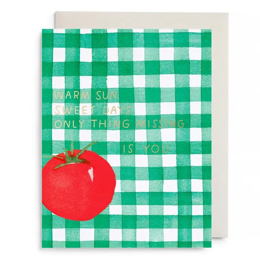 E. FRANCES PAPER’s Tomato Picnic Love & Friendship Card features a green and white checkered design, a red tomato, and gold “Warm sun, sweet days, only thing missing is you.” text. Made in the USA. Envelope included.