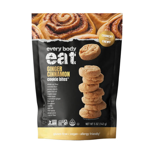 A bag of EVERY BODY EAT - GINGER CINNAMON COOKIE BITES from EVERY BODY EAT, showcasing a stack of delicious gluten-free cookies on the front, cinnamon rolls at the top, and labels emphasizing their vegan and allergy-friendly qualities.