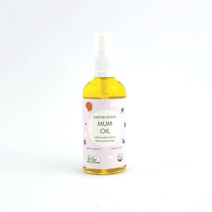 Mum Hydrating Body Oil with Turmeric 100ml - Earthie Koala in a clear spray bottle, showcasing its luxurious texture.
