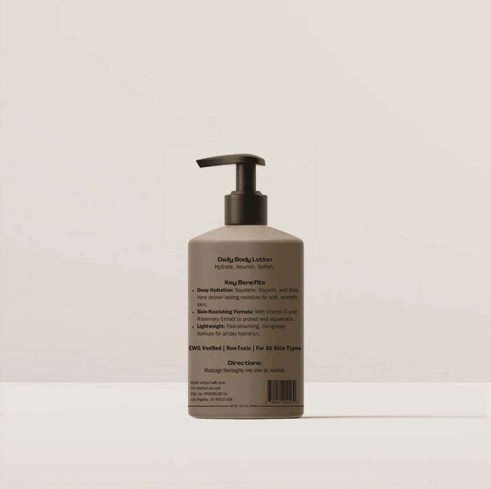 A four-part image showcases the HYGIENELAB - BODY LOTION, UNSCENTED, spotlighting key ingredients Tocopherol, Squalane, and Aloe Barbadensis along with their skin benefits. The composition features a “Clean Non-Toxic Formula” bottle from HYGIENELAB bearing a health certification badge. This dermatologist-approved body lotion is also EWG Verified, ensuring your peace of mind.