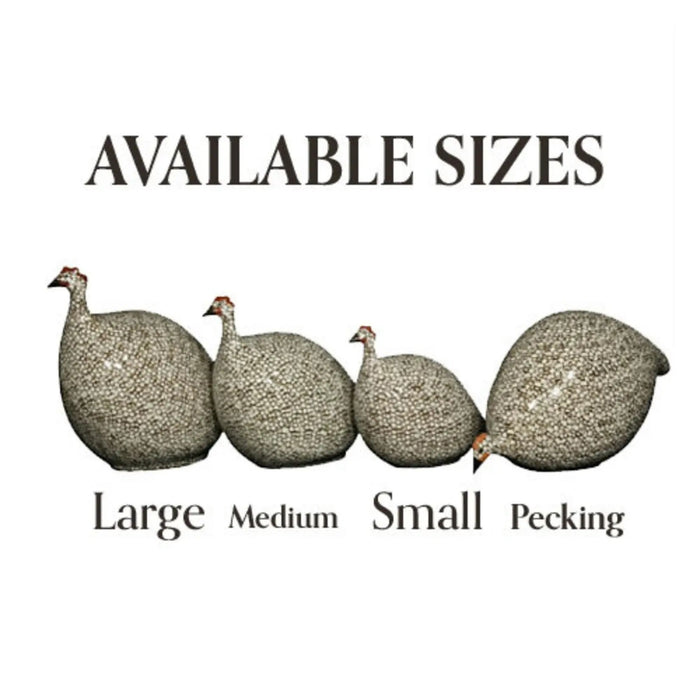 The LES CERAMIQUES DE LUSSAN - PETITE CERAMIC FRENCH GUINEA IN BLACK SPOTTED GREY captures the essence of French brood guinea fowl with its glossy, speckled black and grey finish atop a light base. Its rounded, streamlined design embodies the minimalist yet realistic charm characteristic of LES CERAMIQUES DE LUSSAN's handmade creations.