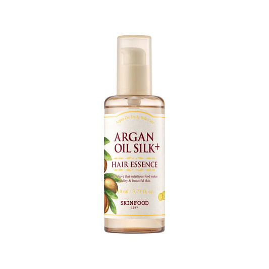 SKINFOOD Argan Oil Silk Plus Hair Essence is a nourishing treatment designed to smooth, hydrate, and add shine to dry or damaged hair. Formulated with Argan Oil and Camellia Seed Oil, it deeply moisturizes and repairs hair strands, while Silk Powder and Ceramide 3 strengthen and protect against breakage. The lightweight, non-greasy formula absorbs quickly, leaving hair silky, soft, and radiant. Perfect for taming frizz and enhancing natural shine.