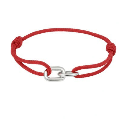 The STOLEN RICHES - BRAGA String Bracelet with Linked Chain in Red features a minimalist nylon cord, an adjustable red band, and a stainless steel interlocking chain accent for durable style.