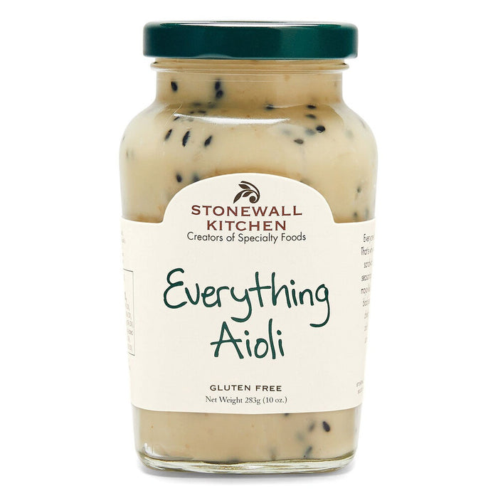 A glass jar of STONEWALL KITCHEN - EVERYTHING AIOLI with a green lid features a creamy, seasoned mayo-like spread. The label reads "Creators of Specialty Foods," "Everything Aioli," and "Gluten Free.