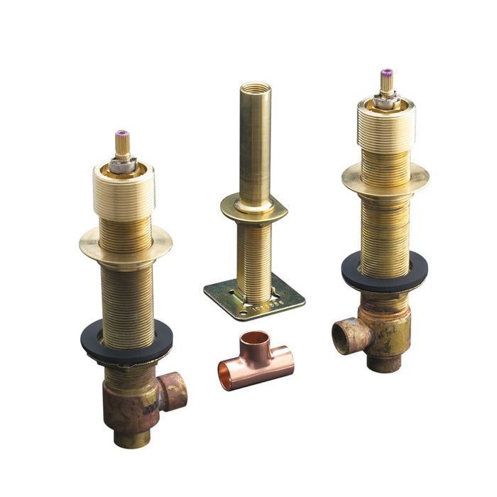 Set of brass plumbing components on a white background