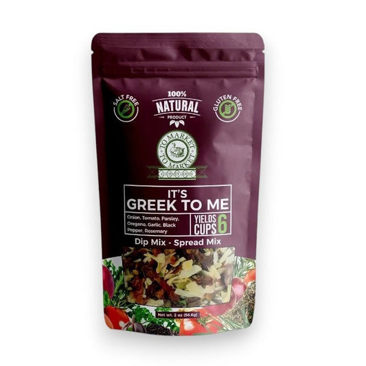 A purple bag of TO MARKET - IT’S GREEK TO ME DIP MIX by TO MARKET- DIPS & SPREADS sits beside a bowl of white dip served with crackers. The packaging highlights a 6-cup yield and features key ingredients like onion, parsley, and oregano, making it an ideal foundation for a Mediterranean spread—just add feta cheese and kalamata olives for an authentic flair.